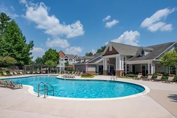 Resort-inspired swimming pool with lounge chairs and wifi hotspot